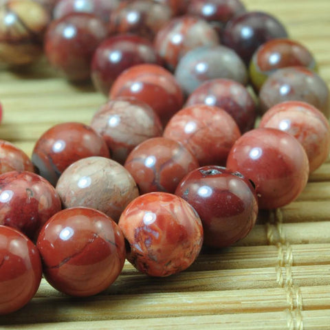 62 pcs of Natural Red Porcelain smooth round beads in 6mm