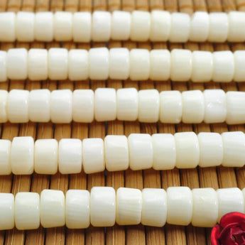 96 pcs of Coral smooth wheel beads in 4x6mm